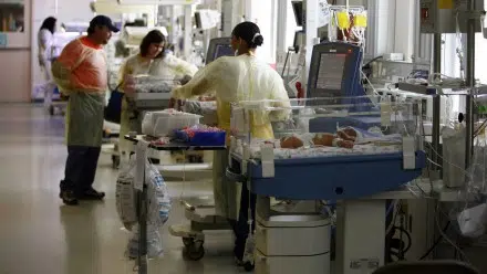 Parents and doctors in a NICU