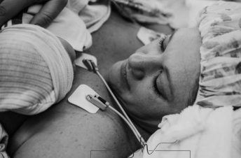 Mother with newborn baby after c-section