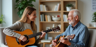 Musicothérapeute : Comment ça marche et quels bienfaits ? Femme musicothérapeute jouant de la guitare avec un senior dans une salle chaleureuse
